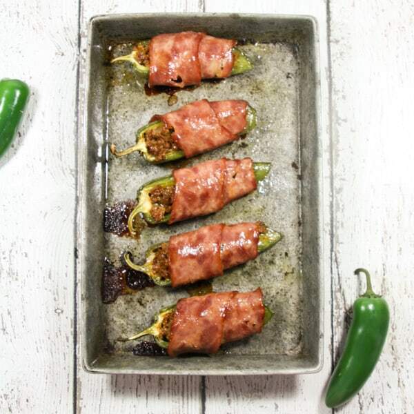 Beefy, creamy, wrapped in bacon and easy to make, these Paleo and Whole30 Jalapeño Poppers are the perfect Super Bowl party snack!