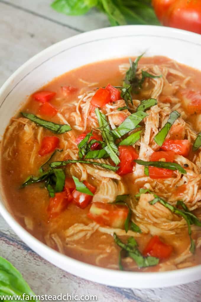 Take just 10 minutes to prep this Paleo & Whole30 Creamy Chicken Tomato Soup, and let your slow cooker do the rest! It's the perfect cold weather busy weeknight meal.