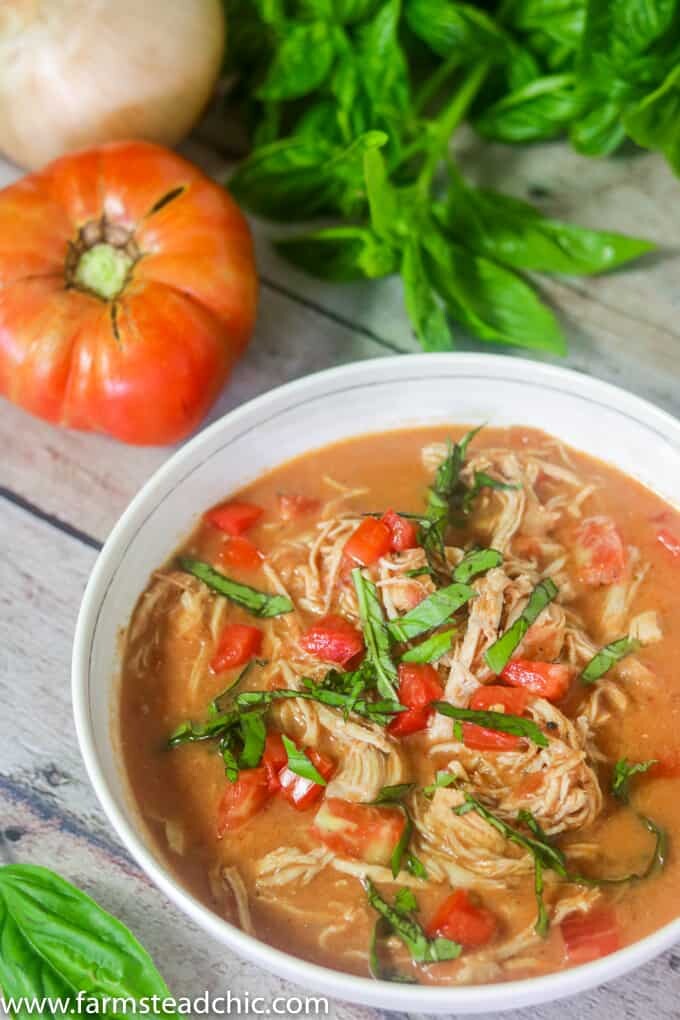 Take just 10 minutes to prep this Paleo & Whole30 Creamy Chicken Tomato Soup, and let your slow cooker do the rest! It's the perfect cold weather busy weeknight meal.