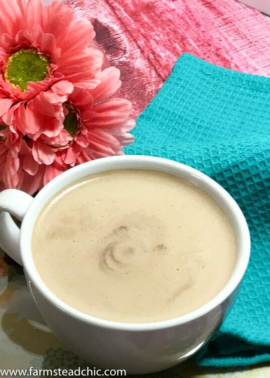 This Paleo & Whole30 Mocha Latte only uses 4 ingredients! Made with only coffee, coconut milk, cacao powder + ground vanilla beans, it's a guilt-free way to start your morning! <3