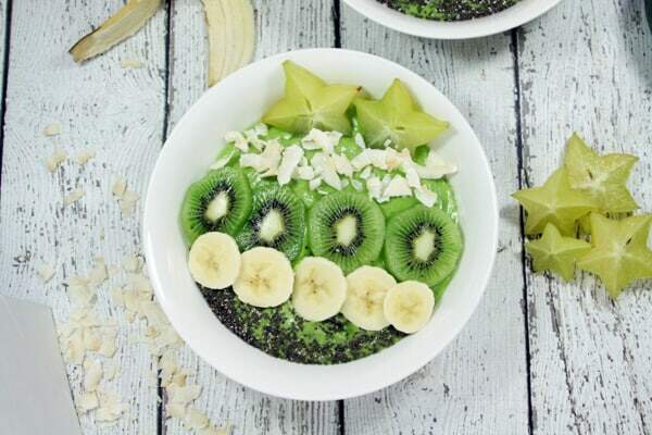 These Paleo and Whole30 Tropical Avocado Smoothie Bowls are on point. Smooth and creamy, they're the perfect detox breakfast after a weekend of cheat meals.