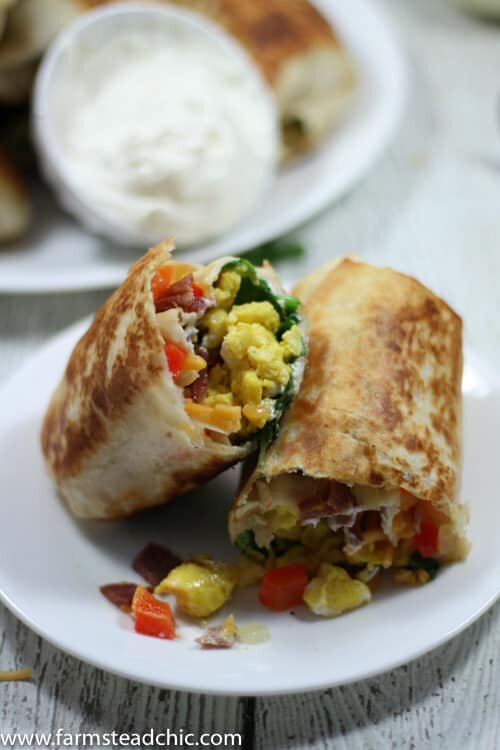 These Bacon and Egg Breakfast Burritos are rolls of ooey-gooey cheesiness + buttery crispiness and are easily altered to fit a Whole30 / Paleo lifestyle!