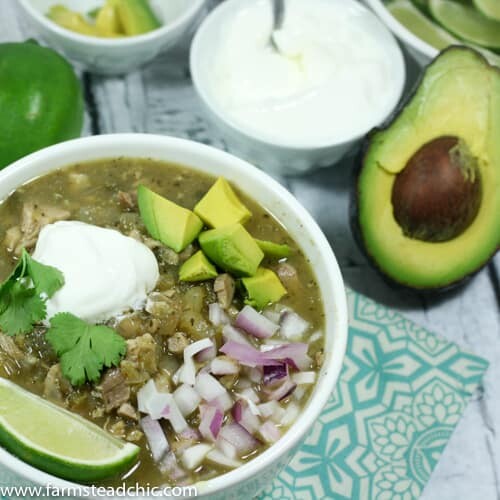 This Instant Pot Paleo and Whole30 White Chicken Chili is dairy-free and a deliciously flavorful one-pot dinner, featuring organic free-range chicken, fire-roasted chiles, sweet yellow onion, and spicy jalapeños with fresh garlic and flavorful + nutritious cumin, coriander and oregano.