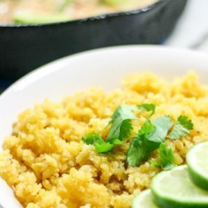 This Paleo and Whole30 Plantain Rice has a texture that's on point and a very subtle tropical flavor which offsets spicy foods perfectly. Gluten free, grain free. Serve it under or alongside everything you love or alone with fresh cilantro and lime juice.