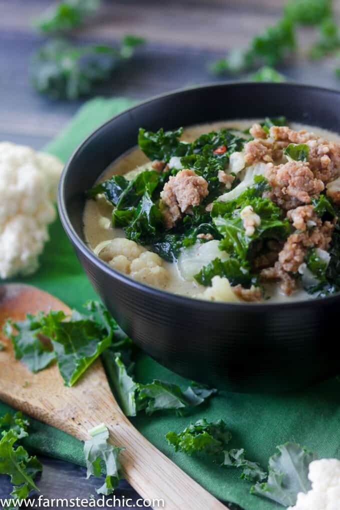 With this Creamy Keto Zuppa Toscana with Cauliflower, you can have your soup, stay low carb + eat it too! Dairy free, gluten free, Whole30, Paleo, low-carb.