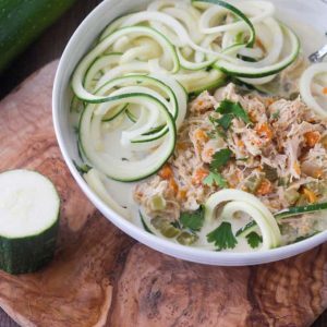 This Paleo and Whole30 Chicken Noodle Soup is gluten-free, grain-free and dairy-free with no added sugar or questionable ingredients. Traditional noodles are replaced with spiralized zucchini, or "zoodles," and the result is an incredibly tasty, truly healthy slow cooker meal with only eight ingredients!