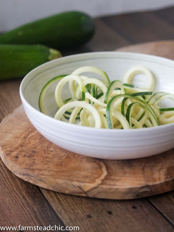 This Paleo and Whole30 Chicken Noodle Soup is gluten-free, grain-free and dairy-free with no added sugar or questionable ingredients. Traditional noodles are replaced with spiralized zucchini, or "zoodles," and the result is an incredibly tasty, truly healthy slow cooker meal with only eight ingredients!