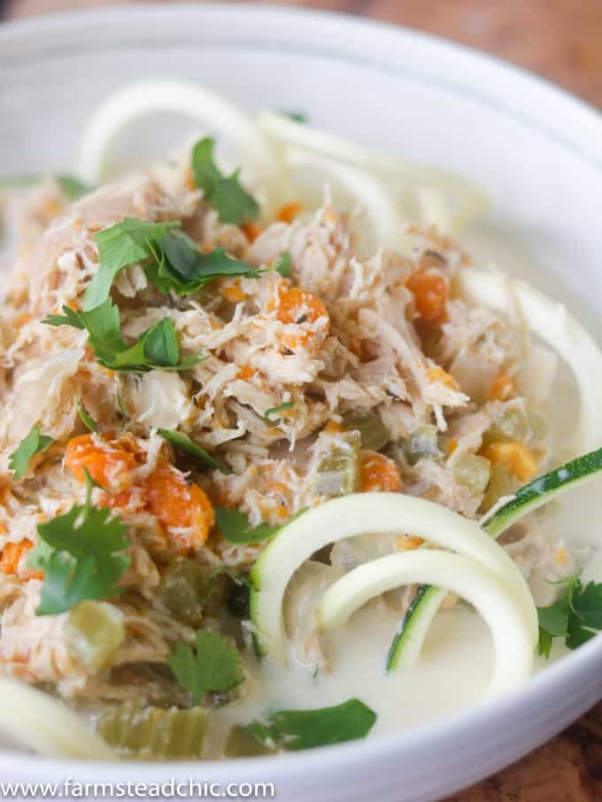 This Paleo and Whole30 Chicken Noodle Soup is gluten-free, grain-free and dairy-free with no added sugar or questionable ingredients. Traditional noodles are replaced with spiralized zucchini, or "zoodles," and the result is an incredibly tasty, truly healthy slow cooker meal with only eight ingredients! 