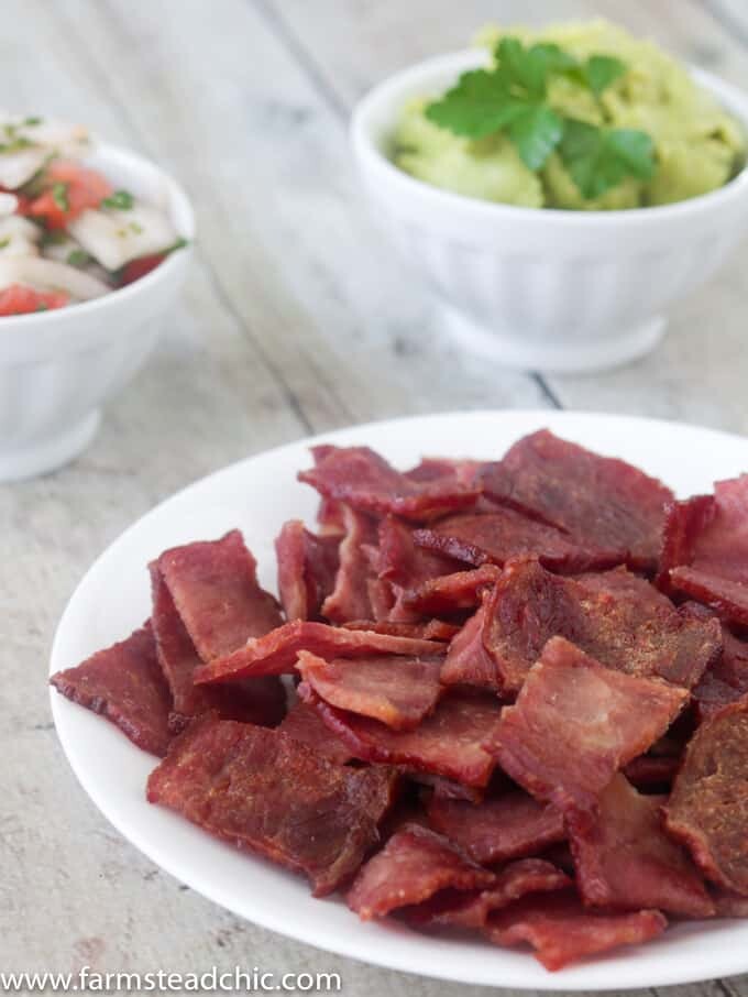 You need these Paleo and Whole30 Bacon Chips in your life. They're such an incredibly easy one-ingredient, grain-free, gluten-free healthy snack option. Prep them on Sunday and take them to work all week. Eat them alone or dip them in guacamole, salsa, habanero hot sauce, pico de gallo, cream cheese... The possibilities are endless! Check 'em out!