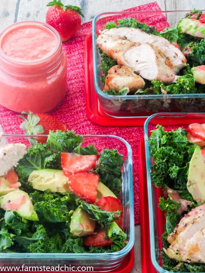 This Paleo and Whole30 Strawberry Avocado Kale Salad has a base of kale. Add grilled chicken to make it a full meal and drizzle with Strawberry Vinaigrette. A simple gluten free, grain free and dairy free superfood meal! Leave off the chicken for a vegetarian and vegan side salad.