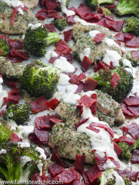 This Paleo and Whole30 Chicken Bacon Ranch Sheet Pan Dinner combines tender, juicy chicken thighs with roasted broccoli, crispy bacon and typical ranch dressing herbs and seasonings like chives, dill, parsley and onion and garlic powder into a one-dish, quick and tasty sheet pan dinner. Gluten free, grain free, dairy free, low carb.
