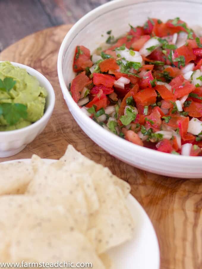 This Paleo and Whole30 Pico de Gallo is a quick and easy appetizer. Fresh tomatoes, onion, garlic, cilantro, lime juice and avocado oil and ten minutes are all you need. Vegan-, vegetarian-friendly.