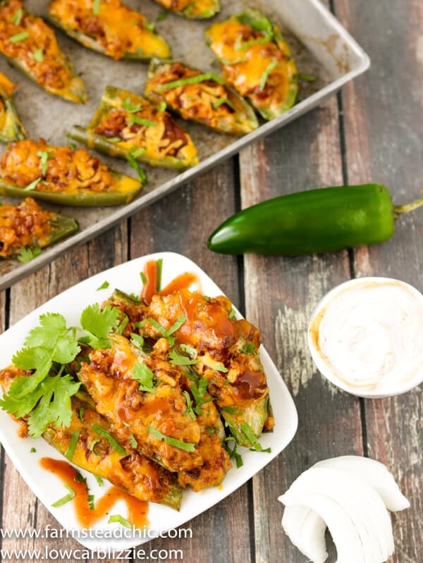 jalapeños stuffed with BBQ and sausage, topped with cheese and cilantro