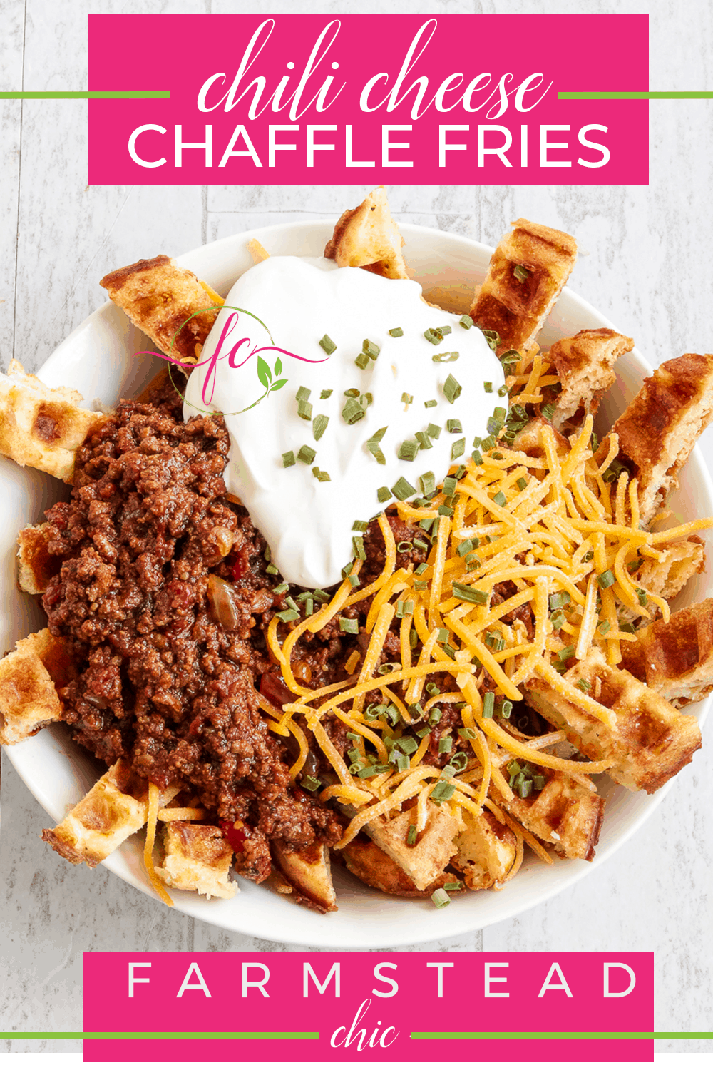 Chow down on these Low Carb, Keto Chili Cheese Chaffle Fries when you're craving some real comfort food. Perfectly firm and crispy chaffles are sliced into "fries," piled with meaty, beanless chili and topped with cheddar cheese, a hefty dollop of sour cream and a sprinkling of vibrant, flavorful chives.   