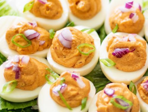 These Korean kimchi keto deviled eggs are a spicy and flavorful twist on traditional deviled eggs. Made with only four ingredients (plus S&P), they a super simple, naturally low carb and keto-friendly appetizer or snack.
